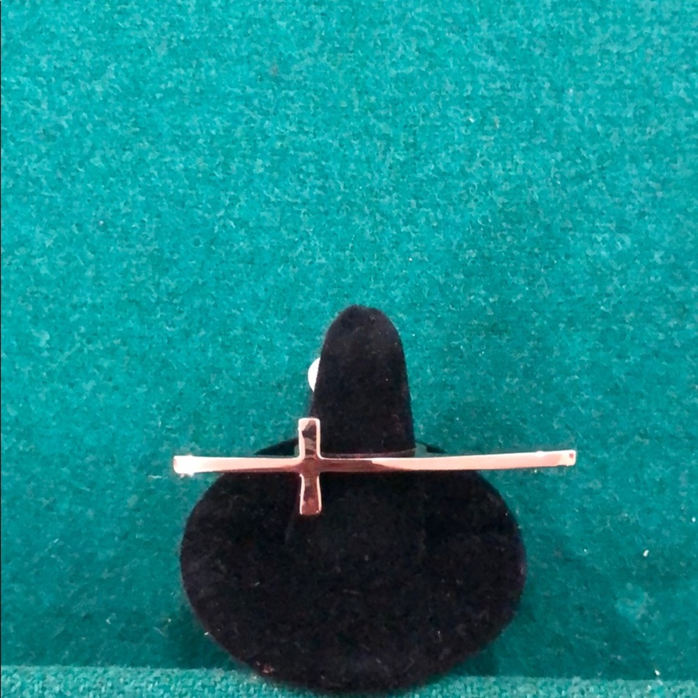 Sideways cross Ring